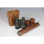 A pair of Ross of London military issue lacquered brass binoculars, in leather case numbered 5291,