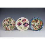 Three Moorcroft calendar plates, to include; 1985, decorated with Anemone against a cream ground,