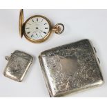 An engraved silver cigarette case, Birmingham 1920, 9cm, a Victorian silver vesta case,
