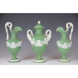 A garniture of three green jasper cameo ware style wares,