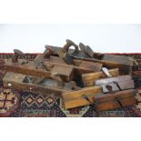 A collection of carpenters planes and moulding planes,