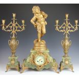 A 19th century French gilt spelter and onyx clock garniture,