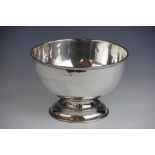 A large silver pedestal bowl Daniel George Collins, Sheffield 1908, of plain polished form,