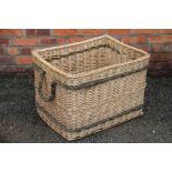 A modern wicker log basket, of rectangular form,