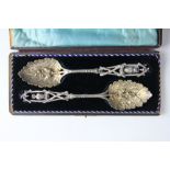 A pair of mid 19th century silver plated novelty serving spoons,