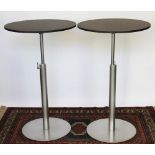 A pair of Italian Lapalma Brio adjustable circular tables,