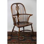 An ash and elm Windsor arm chair,