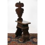A late 17th/early 18th century walnut Scabello chair,