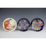 Three Moorcroft calendar plates, to include; 1995, decorated with a squirrel, painted '280/500',