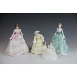 A collection of four Coalport figurines, to include; Royal Premiere CW532/7500, 23cm high,