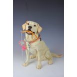 A Country Artists Top Dogs 'Laddie, Golden Labrador', realistically modelled, seated,