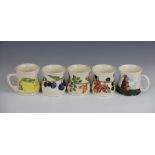 Five Moorcroft mugs, decorated with plums, lemons, rose hips,