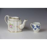 A Caughley coffee cup circa 1780, printed in blue with fruit sprays below a blue lined rim,