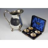 A set of four shell shaped salts and spoons, Birmingham 1904, cased,