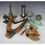 A selection of vintage shoe trees, with an assortment of modern magnifying glasses, treen,