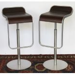 A pair of Italian Lapalma LEM swivel bar stools, with curved wood seat,