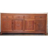 A Chinese carved hardwood sideboard, with four drawers and four cupboard doors on moulded legs,