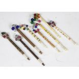 A collection of lace making bobbins, to include; six bone examples,