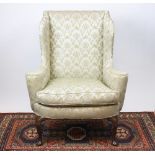 A Queen Anne style wing arm chair,