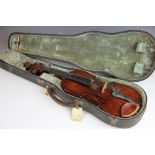 A cased violin,