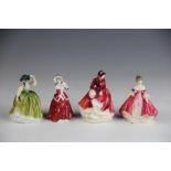 Four Royal Doulton figures, to include; Buttercup HN3268 10cm high, Christmas Morn HN3212 10cm high,