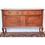 A 1920's mahogany sideboard, two drawers over two cupboard doors, 91cm H x 137cm W x 50cm D,