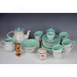 A selection of Poole Pottery tea wares, in grey spatter pattern with contrasting duck egg,