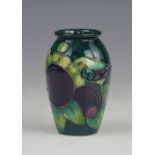 A Moorcroft Finches pattern vase, signed in gilt 'J Moorcroft 11.04.