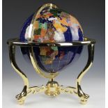 A specimin hardstone terrestrial globe, with brass meridian and stand,