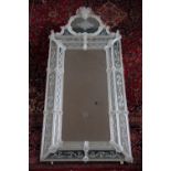 A large Venetian glass wall mirror,