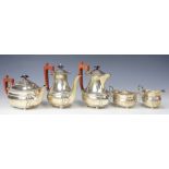 A silver five piece tea and coffee service, Elkington and Co, Birmingham 1964, each of oval form,