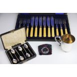 A cased set of six Art Deco silver coffee spoons, A J Bailey, Birmingham 1942,