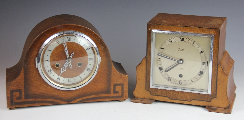 An Art Deco Everite oak cased mantle clock, retailed by H Samuel, Manchester,