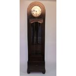 A 1920's oak longcase clock,