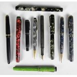A Swan Mabie Todd fountain pen, with marbled green/black finish, a Conway Stewart No 479,