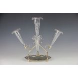 A late Victorian silver plated and cut glass epergne, with four cut glass trumpet vases,