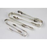 Two fiddle pattern silver sugar tongs, London 1874 and London 1808,