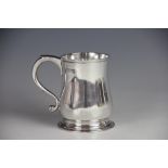 An Edwardian silver christening mug, of baluster form, London 1904, 5.