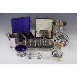 A collection of silver and plated wares, to include; silver handled butter knives,