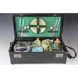 A Brexton picnic hamper, with fitted contents including a kettle, square teapot, storage jars,