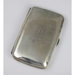 An Edwardian silver cigar case, George Unite, Birmingham 1906, monogrammed and with gilt interior,