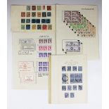 A collection of used and mounted stamp sheets, Queen Victoria and later,