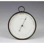 A brass aneroid barometer, the enamel dial signed T. B. Winter Newcastle, 23.