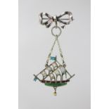 A Galleon pendant, 19th century, the white metal enamelled pendant,