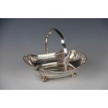 A silver swing basket, Atkin Brothers, Sheffield 1925, of lobed form,