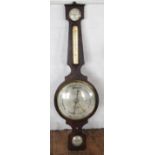 A 19th century mahogany wheel barometer of large proportions,