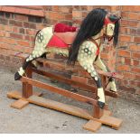 A painted pine rocking horse,