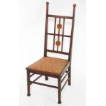 An Art Nouveau stained beech bedroom chair,