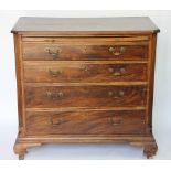 A George III mahogany chest with brush slide above four graduated drawers with fluted corner angles,