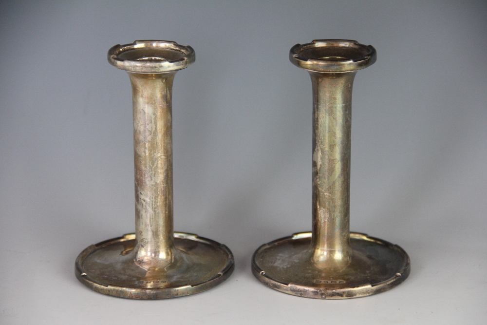 A pair of silver candlesticks, A & J Zimmerman, Birmingham 1921,